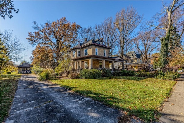 view of property exterior featuring a gazebo, covered porch, and a lawn