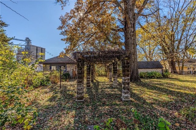 view of front of home with stone siding and a front lawn