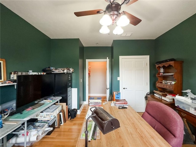1165 Crooked Ln, Dennison, IL 62423 - office area featuring light wood-style floors, ceiling fan, and visible vents