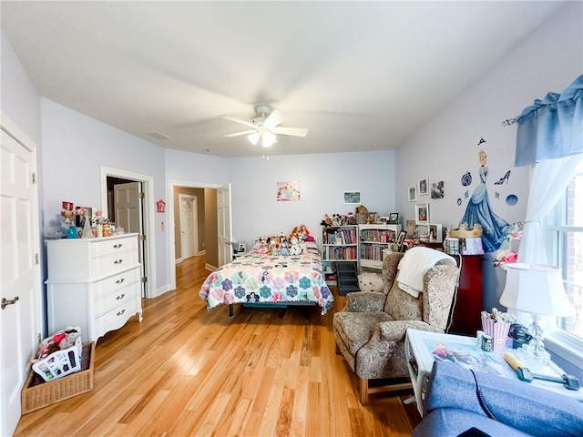 1165 Crooked Ln, Dennison, IL 62423 - bedroom with light wood-style flooring, visible vents, and a ceiling fan