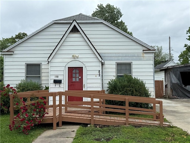 706 Douglas St, Paris, IL 61944 - view of front of house with a wooden deck