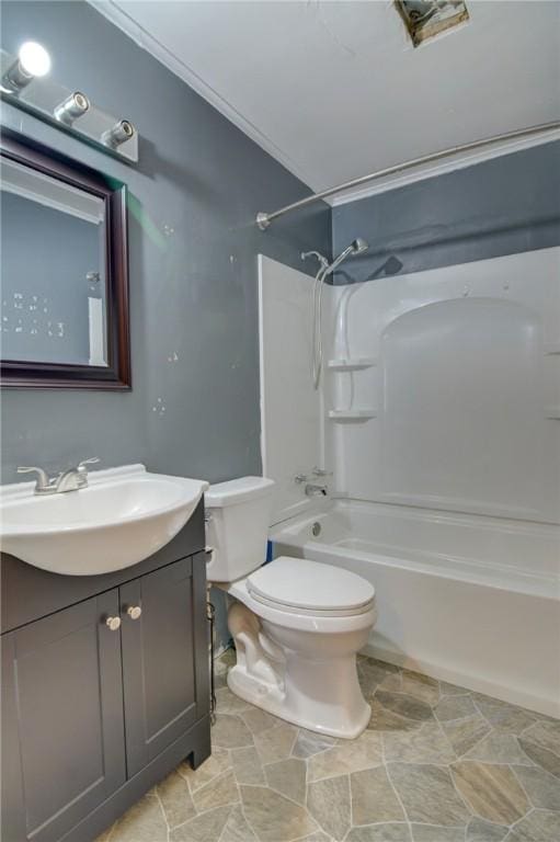 full bathroom with vanity, crown molding, shower / tub combination, and toilet