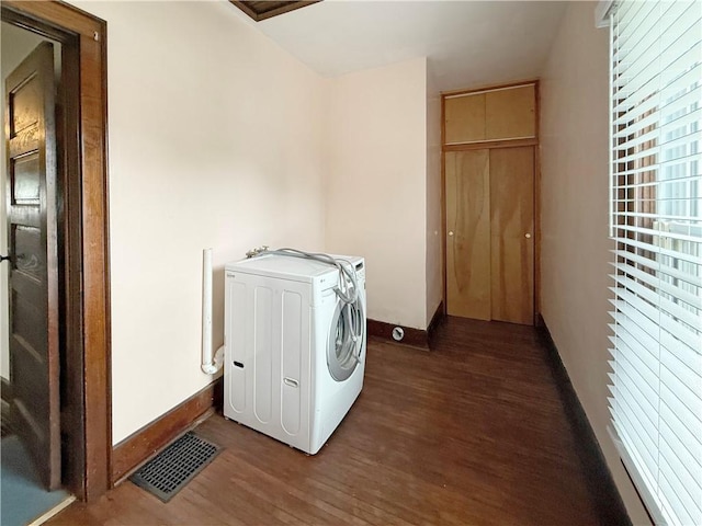 111 Andrew St, Paris, IL 61944 - washroom featuring washer and dryer and wood finished floors