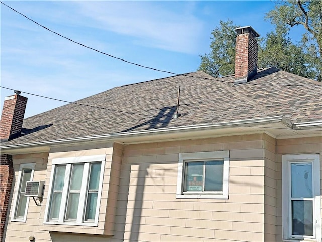 111 Andrew St, Paris, IL 61944 - exterior view of roof with shingles and a chimney