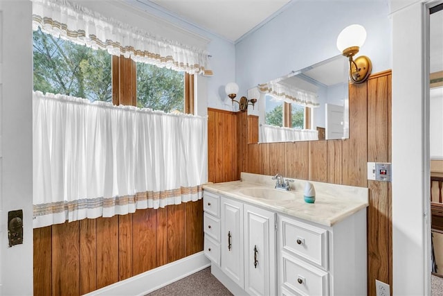 bathroom with plenty of natural light and vanity