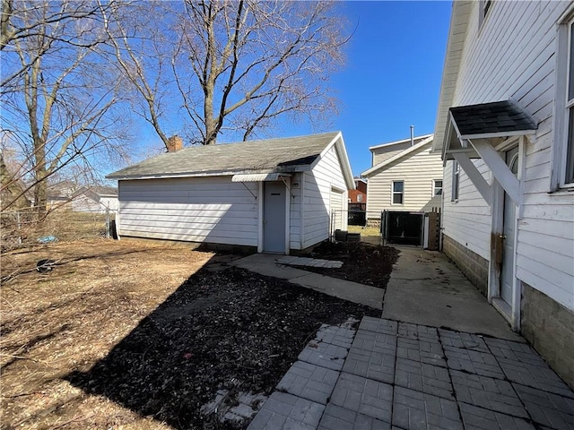108 W Virginia Ave, Effingham, IL 62401 - exterior space featuring a chimney, an outdoor structure, and a gate