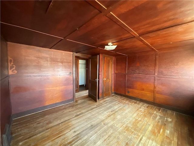 108 W Virginia Ave, Effingham, IL 62401 - additional living space with hardwood / wood-style floors, wooden ceiling, and wooden walls