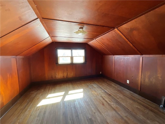 108 W Virginia Ave, Effingham, IL 62401 - bonus room featuring wood walls, vaulted ceiling, and hardwood / wood-style floors