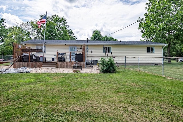 2430 Baker Ln, Decatur, IL 62526 - rear view of house with a wooden deck and crawl space