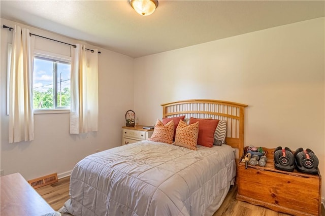 2430 Baker Ln, Decatur, IL 62526 - bedroom featuring light wood-type flooring