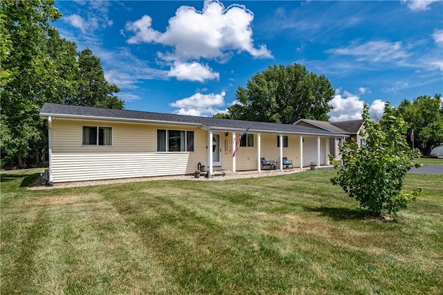 2430 Baker Ln, Decatur, IL 62526 - ranch-style home featuring a front lawn and a porch