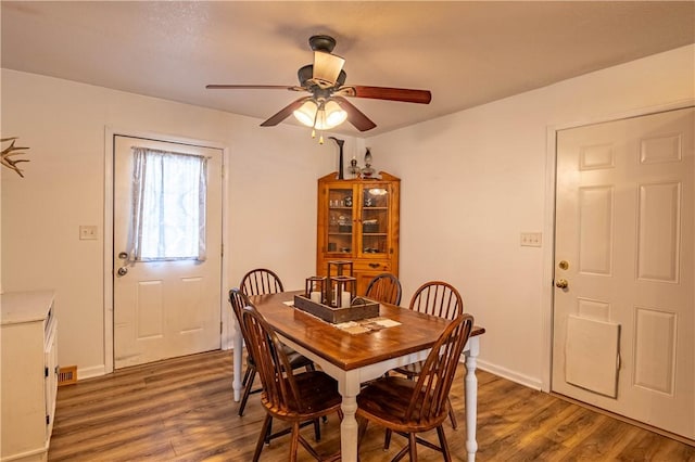 2430 Baker Ln, Decatur, IL 62526 - dining room with wood finished floors and ceiling fan