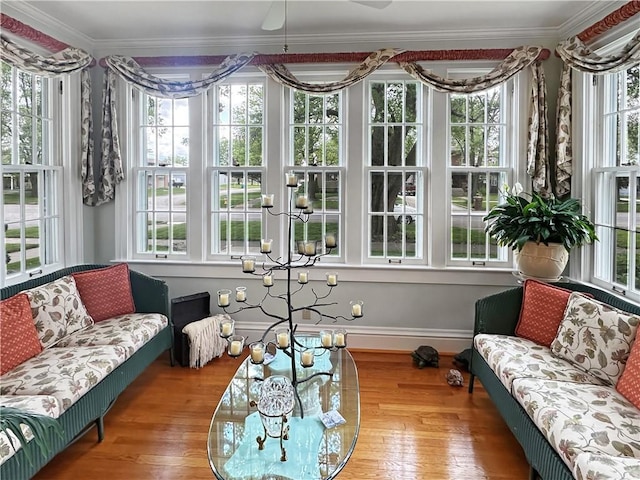 sunroom featuring plenty of natural light, french doors, and a chandelier