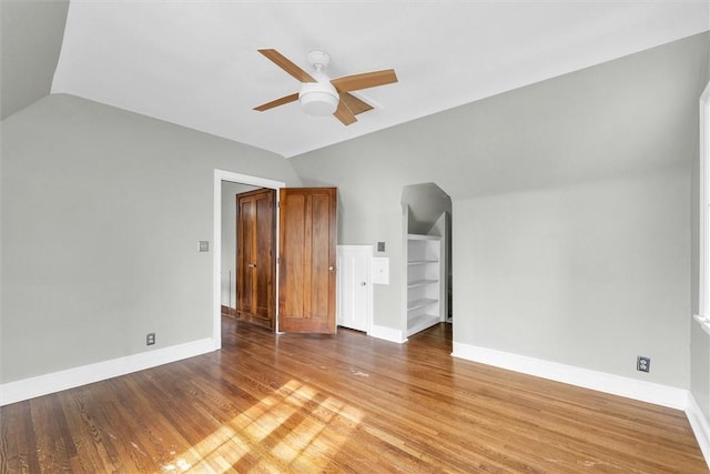 1655 N Vermilion St, Danville, IL 61832 - interior space with vaulted ceiling, wood finished floors, baseboards, and ceiling fan