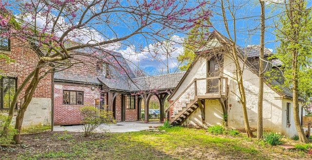 1655 N Vermilion St, Danville, IL 61832 - view of front of property featuring brick siding and stairway