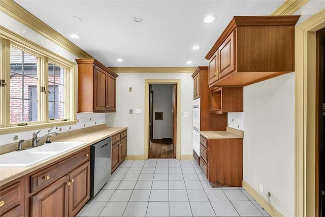 1655 N Vermilion St, Danville, IL 61832 - kitchen featuring light countertops, stainless steel dishwasher, and a sink