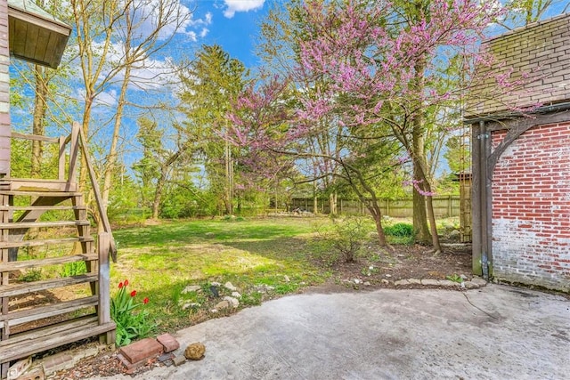 1655 N Vermilion St, Danville, IL 61832 - view of yard featuring a patio area, fence, and stairs