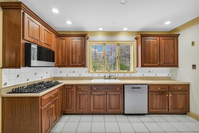 1655 N Vermilion St, Danville, IL 61832 - kitchen with a sink, gas cooktop, tasteful backsplash, and dishwasher