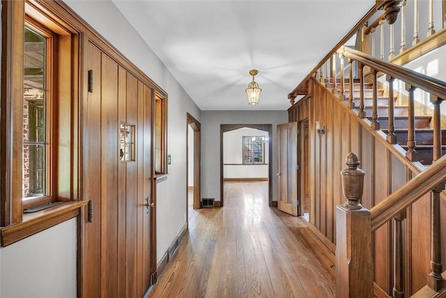 1655 N Vermilion St, Danville, IL 61832 - hall with stairway, baseboards, light wood-type flooring, and visible vents