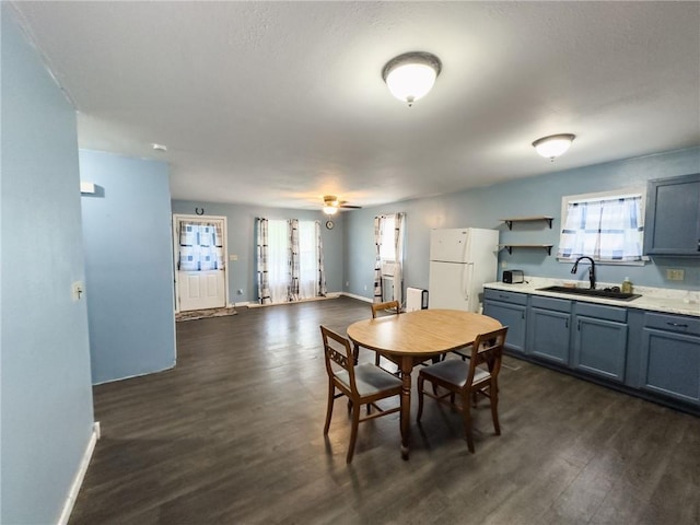1402 N Howard St, Robinson, IL 62454 - dining area featuring dark wood-style flooring and a ceiling fan