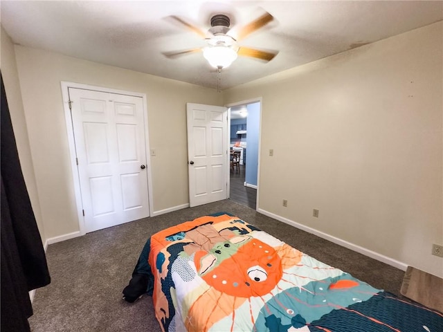 1402 N Howard St, Robinson, IL 62454 - bedroom with dark colored carpet and ceiling fan