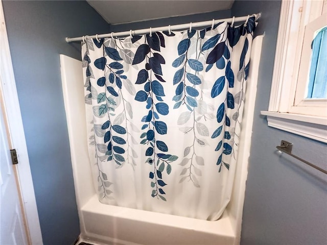 1402 N Howard St, Robinson, IL 62454 - bathroom with shower / bathtub combination with curtain