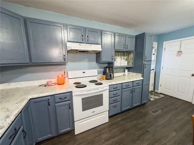 1402 N Howard St, Robinson, IL 62454 - kitchen featuring electric range, under cabinet range hood, dark wood finished floors, and light stone countertops