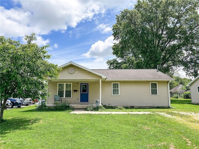 1402 N Howard St, Robinson, IL 62454 - view of front facade with a front lawn, covered porch, and crawl space