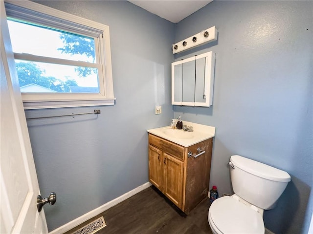 1402 N Howard St, Robinson, IL 62454 - bathroom featuring vanity and wood finished floors