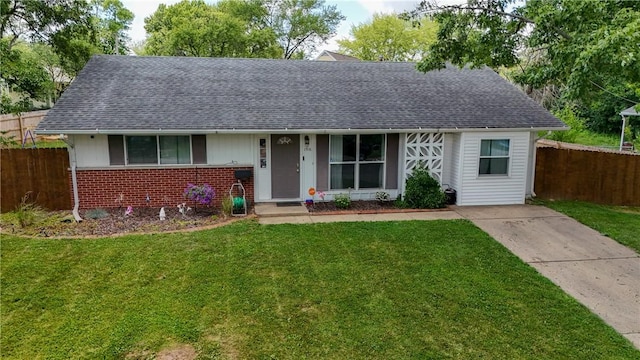 1516 Eastview Ave, Danville, IL 61832 - view of front of house with a shingled roof and brick siding