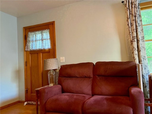 3117 Oak Ave, Mattoon, IL 61938 - living area with baseboards and carpet flooring