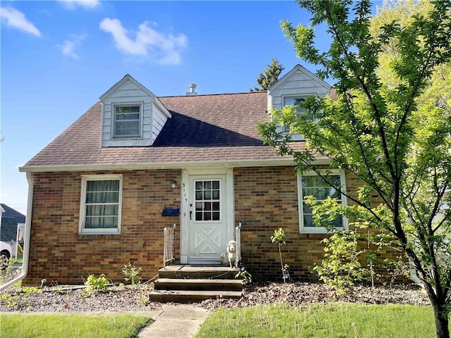 3117 Oak Ave, Mattoon, IL 61938 - view of front facade featuring brick siding and a shingled roof