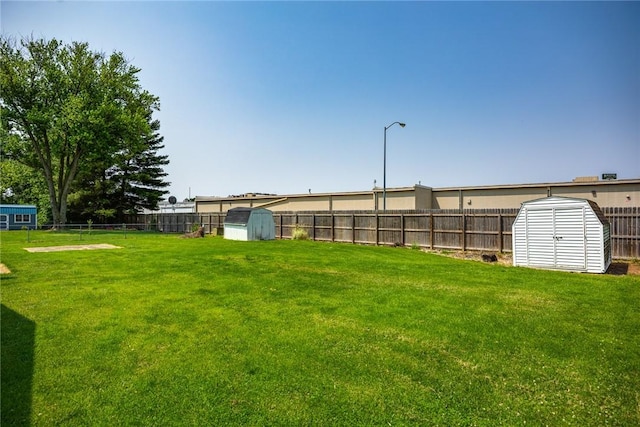 1009 Henrietta St, Effingham, IL 62401 - fenced backyard with a storage shed