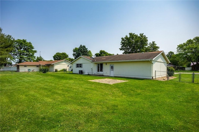 1009 Henrietta St, Effingham, IL 62401 - rear view of house with a gate and a patio area