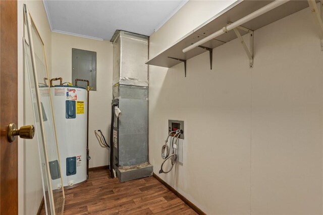 1009 Henrietta St, Effingham, IL 62401 - laundry area featuring washer hookup, water heater, dark wood-style floors, ornamental molding, and electric panel