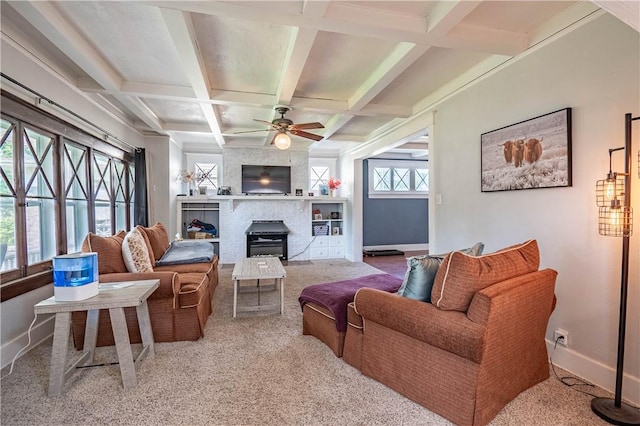 1440 W Decatur St, Decatur, IL 62522 - living area featuring a large fireplace, coffered ceiling, carpet, ceiling fan, and beamed ceiling