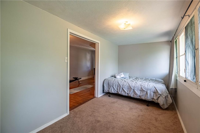 1440 W Decatur St, Decatur, IL 62522 - bedroom featuring carpet and a textured ceiling