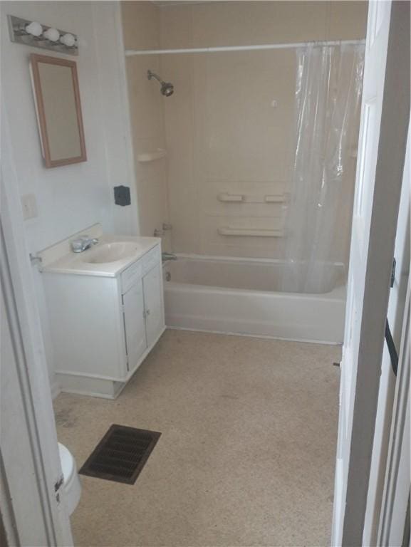 full bathroom with toilet, vanity, and shower / bath combination with curtain