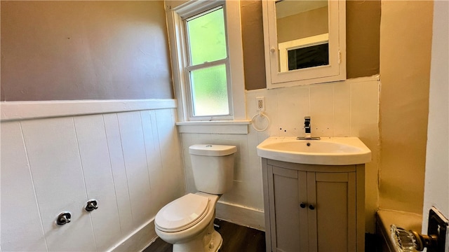 bathroom with vanity and toilet