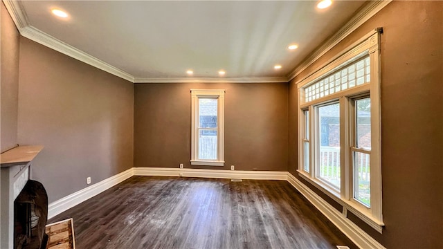 unfurnished living room featuring dark hardwood / wood-style flooring, plenty of natural light, and crown molding