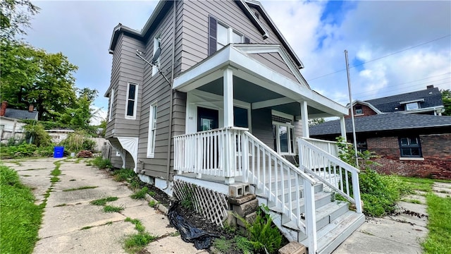 view of front of home featuring covered porch