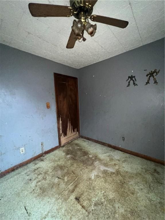 902 N Robb St, Robinson, IL 62454 - empty room featuring ceiling fan and baseboards