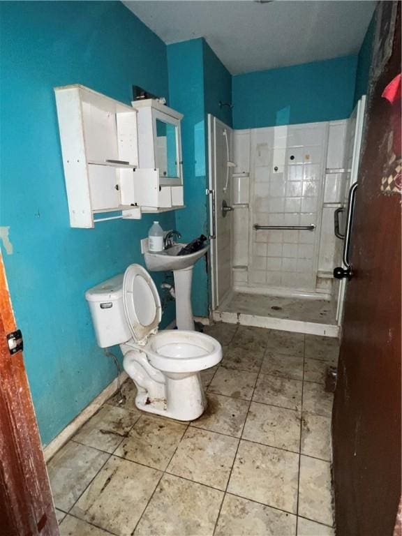 902 N Robb St, Robinson, IL 62454 - bathroom featuring a shower stall and tile patterned flooring