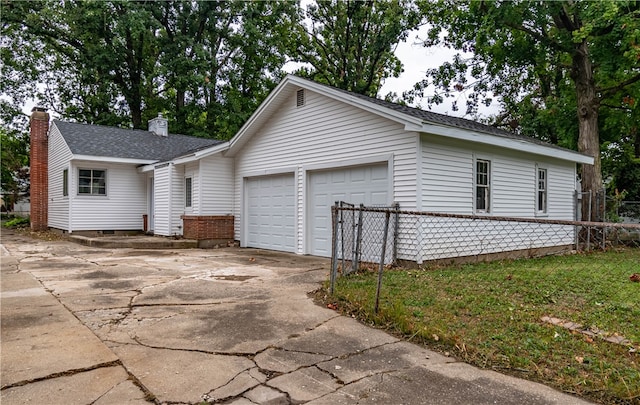 view of home's exterior with a garage