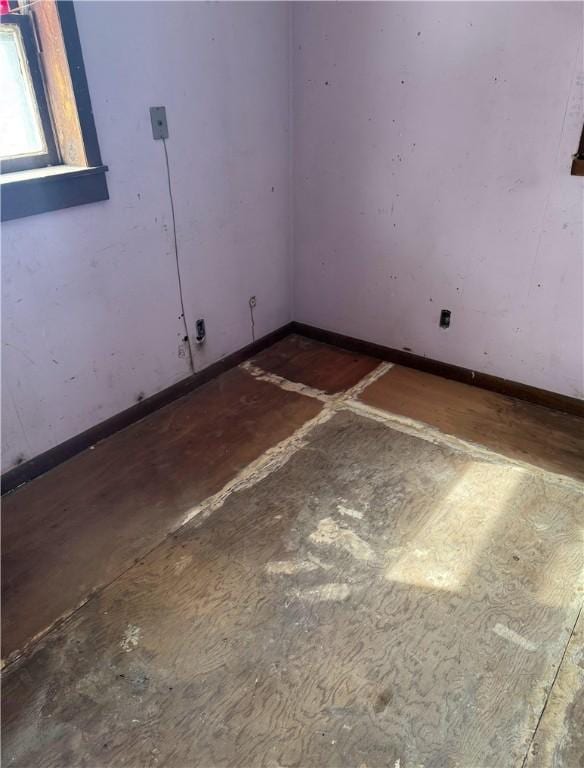 empty room with baseboards