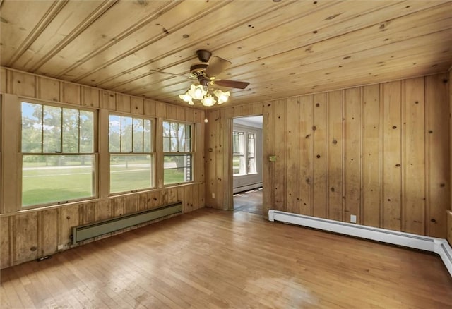 3920 Western Ave, Mattoon, IL 61938 - unfurnished sunroom featuring baseboard heating
