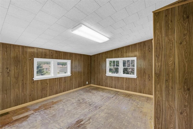 3920 Western Ave, Mattoon, IL 61938 - empty room with wood finished floors and wooden walls