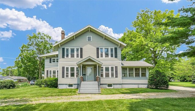 3920 Western Ave, Mattoon, IL 61938 - view of front of house with a front lawn and a chimney
