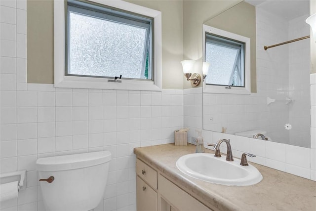 3920 Western Ave, Mattoon, IL 61938 - full bath featuring vanity, tile walls, and a shower
