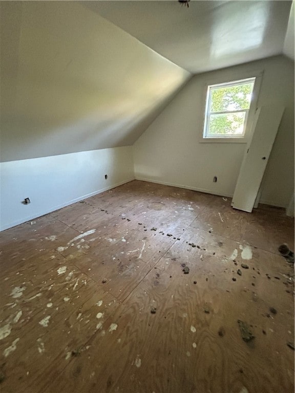 bonus room with vaulted ceiling